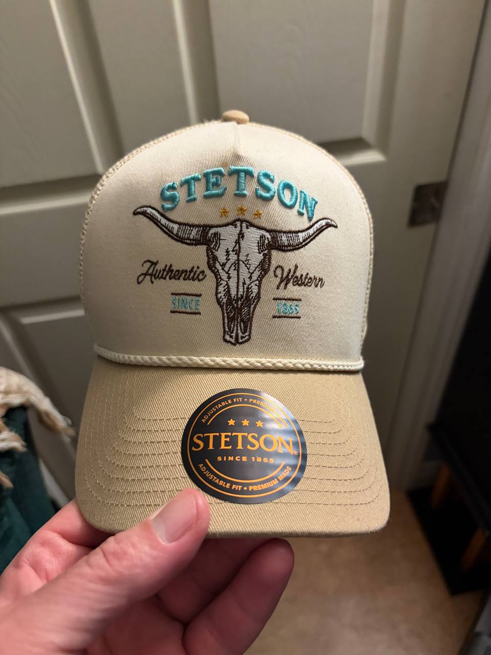 Stylized Stetson cap icon